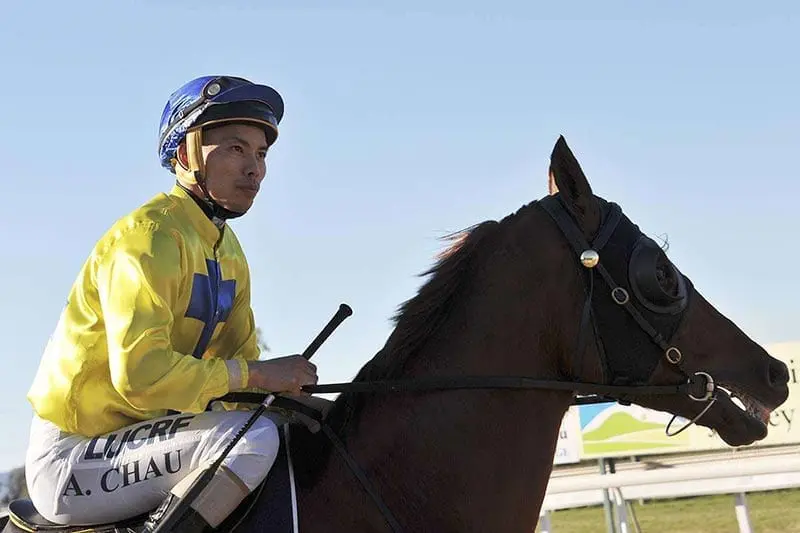 Allan Chau riding Strong Boy at Quirindi