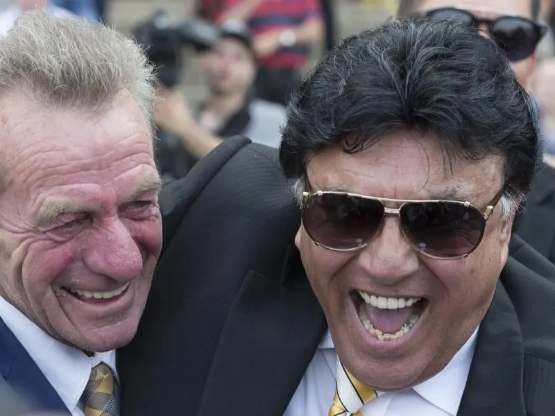 Trainer Gerald Ryan and owner Bert Vieira celebrate after Trapeze Artist's win in the Golden Rose. Gerald Ryan and Bert Vieira