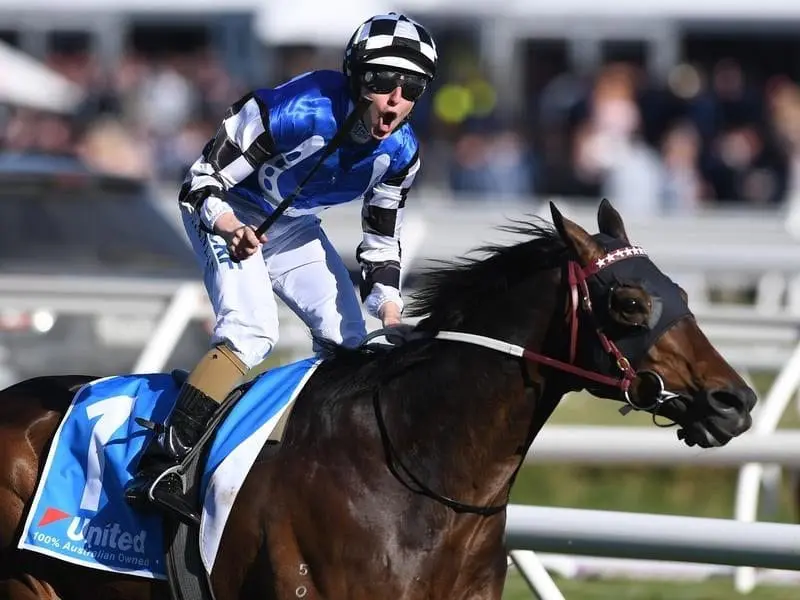 Former Japanese middle-distance star Tosen Stardom wins the Toorak Handicap. Damian Lane reacts after riding Tosen Stardom to victory