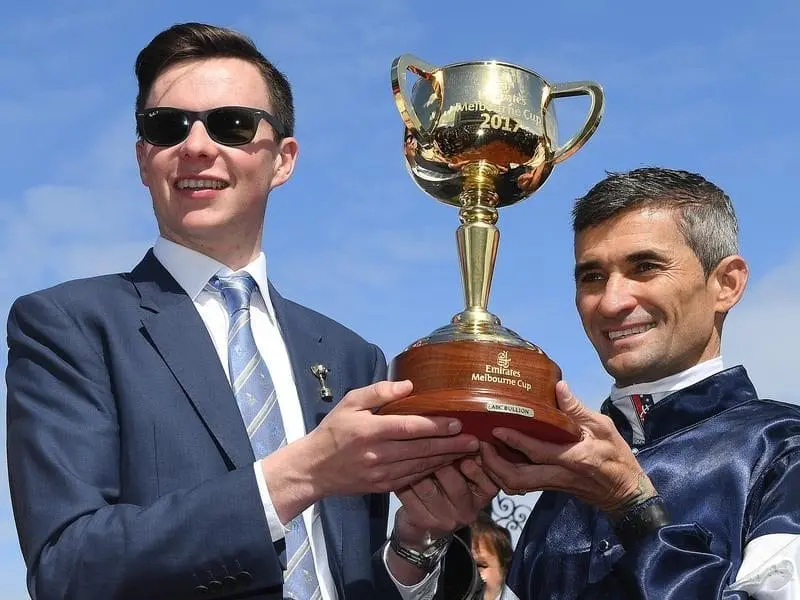 Joseph O'Brien and Corey Brown share the spoils of Melbourne Cup victory. Joseph O'Brien and Corey Brown.