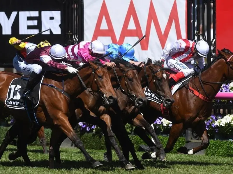 Dean Yendall rides Shoals (right) to victory in the Myer Classic at Flemington. Shoals wins the Myer Classic at Flemington.