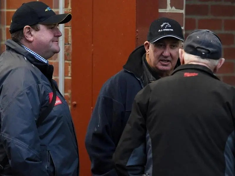 Trainer Pat Webster (centre) hopes to give Irish apprentice Robbie Dolan his first Sydney winner. pat