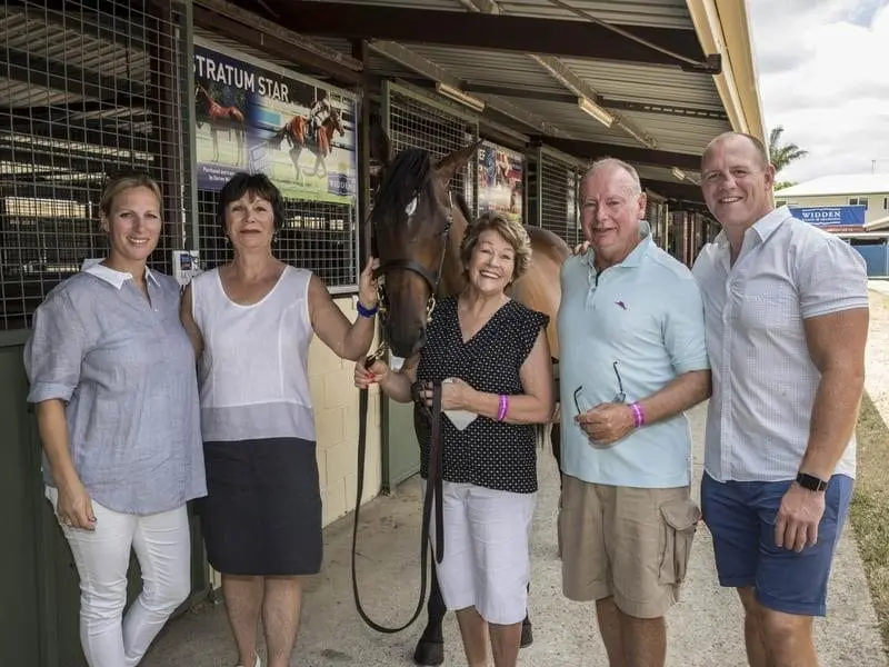 Mike Tindall (r) and his wife Zara Phillips (l) and the buyers of his filly at the Millions sale. filly