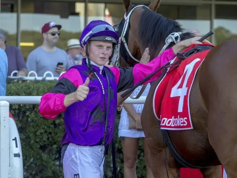 Apprentice Ethan Brown continued his affinity with Sandown, riding a treble at the midweek meeting. Ethan Brown after winning on Hell On Earth.