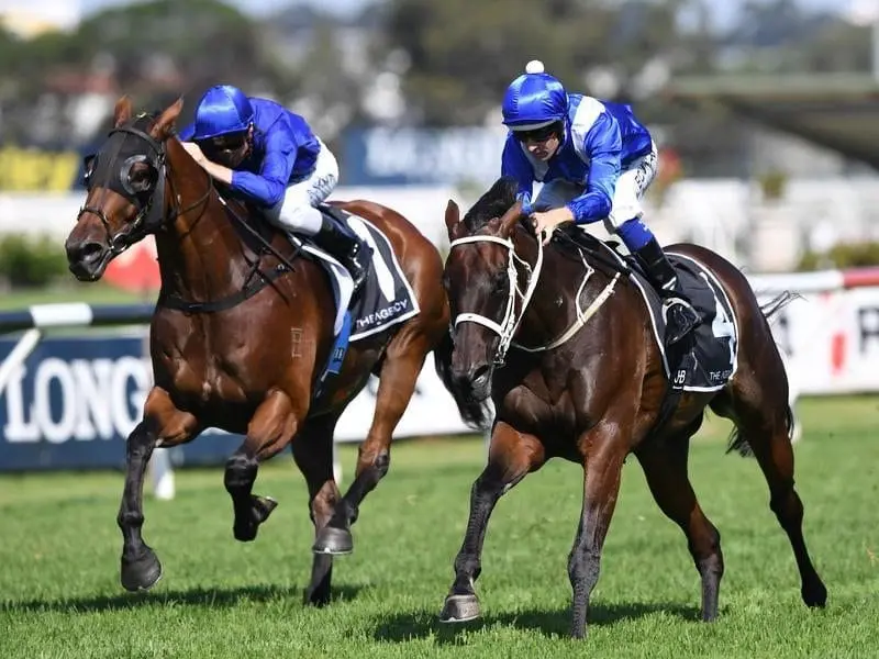 Winx ridden by Hugh Bowman (right)