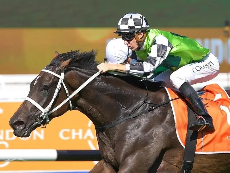 Jockey Jason Collett riding Unforgotten to win race 6.