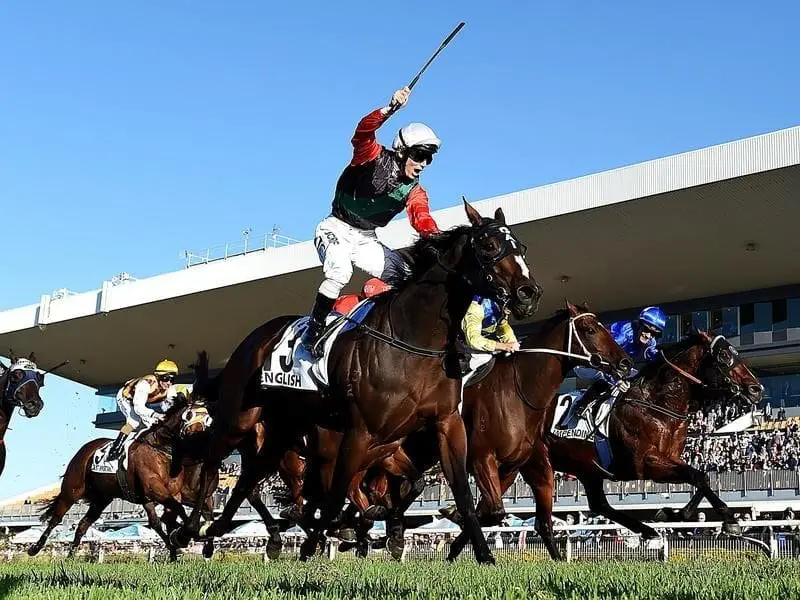 Jockey Tim Clark has produced a ground-saving ride to win the Group One Doomben 10,000 on English. English wins the Doomben 10,000.