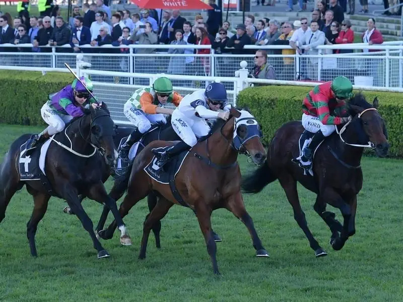 Karavali (right) wins at Randwick