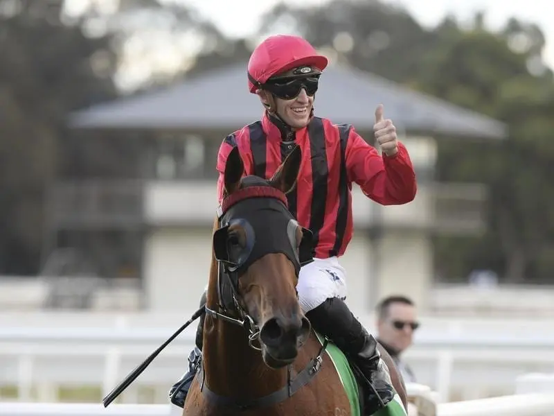 Jockey Joshua Parr returns to scale on Sweet Victory