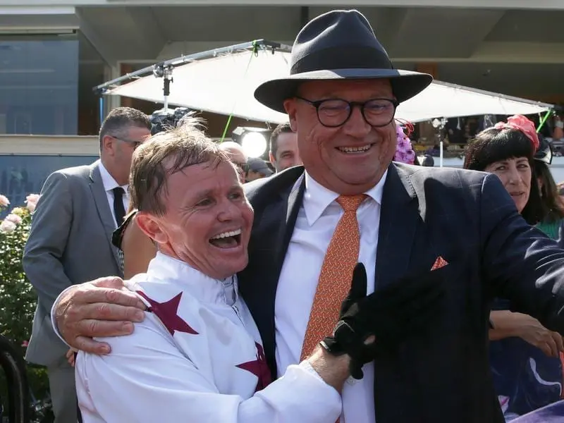 Trainer Tony McEvoy (right) has praised jockey Barend Vorster for his coolness under pressure. Jockey Barend Vorster with trainer Tony McEvoy (file image)
