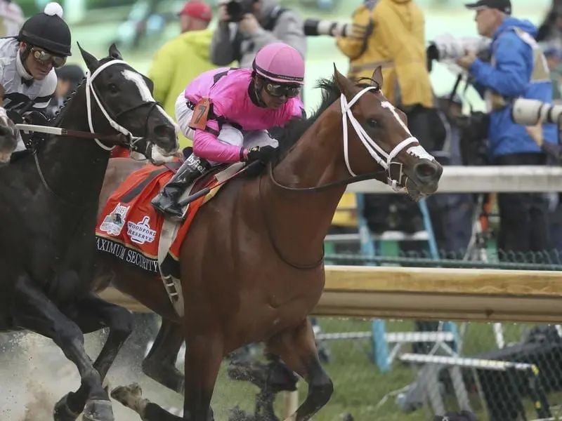 Ownerf of Maximum Security' (r) will consider an appeal against his Kentucky Derby disqualification. maximum security