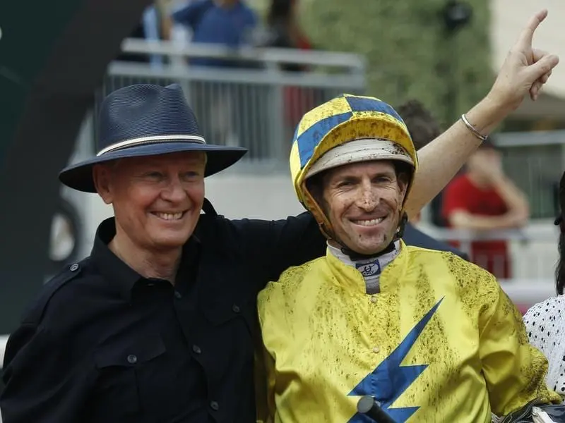 Ex-pat Aust trainer John Moore (l) is considering a move home if forced to retire from Hong Kong. john moore
