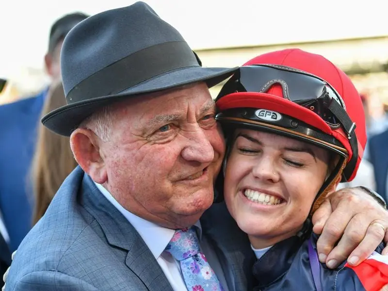 Leon Macdonald and Raquel Clark after Dalasan's win at Flemington.