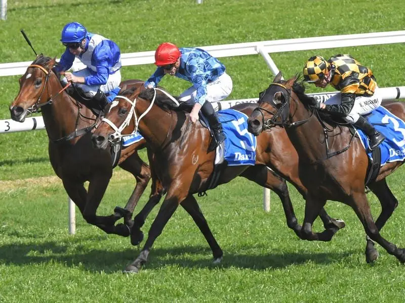 Funstar (centre) wins the Group Two Tea Rose Stakes.