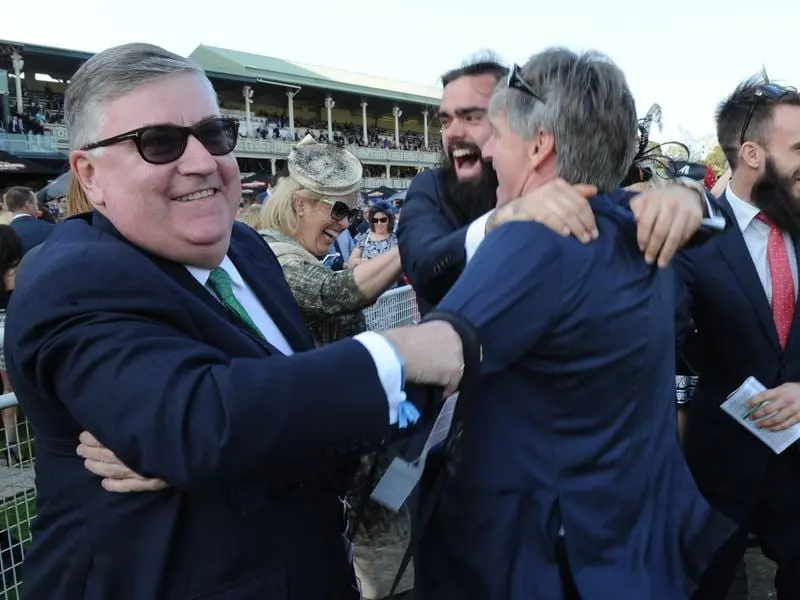 Richard Pegum (l) has secured a 25 per cent share in Cups contender Mustajeer via an online auction. richard pegum