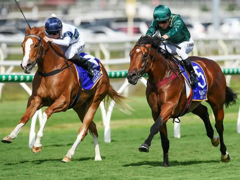 Jockey Kerrin McEvoy rides King's Legacy (right) to victory