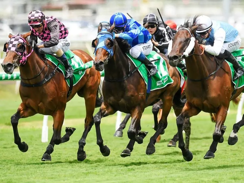 Jockey Jason Collett rides Great Powers (far right)