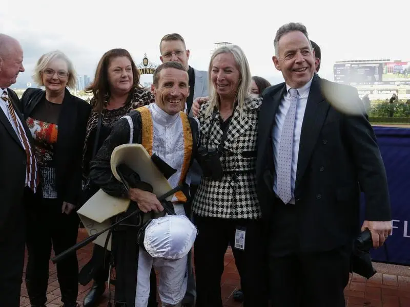 Trainer Simon Morrish (right) is looking to Ocean's Fourteen to bring his winning form to town. simon morrish (r)