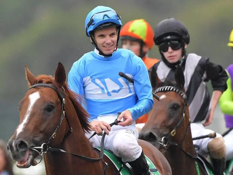 Tim Clark returns to scale after riding Embracer to victory a Rosehill