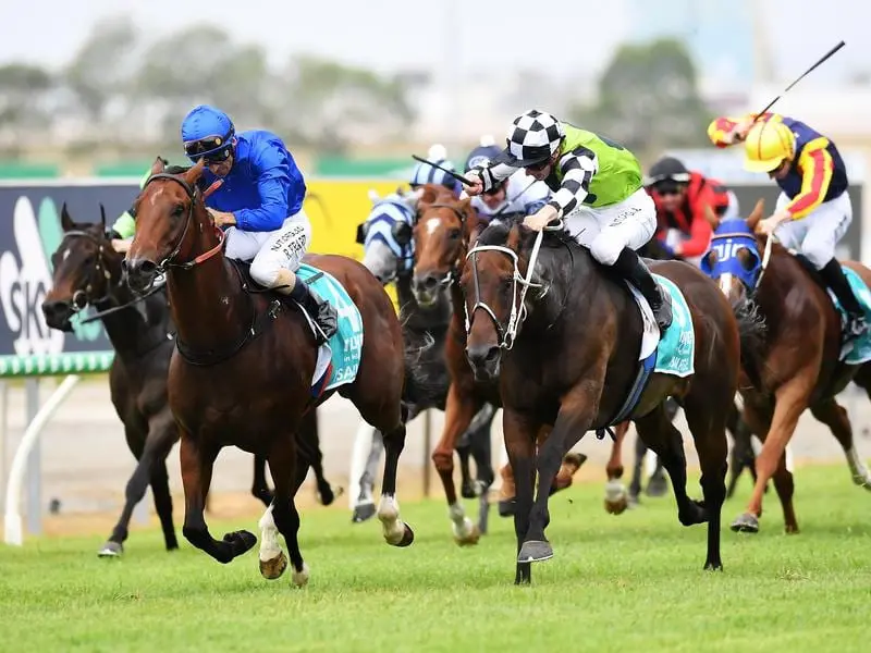 Madam Rougue (right) wins the Magic Millions Snippets.