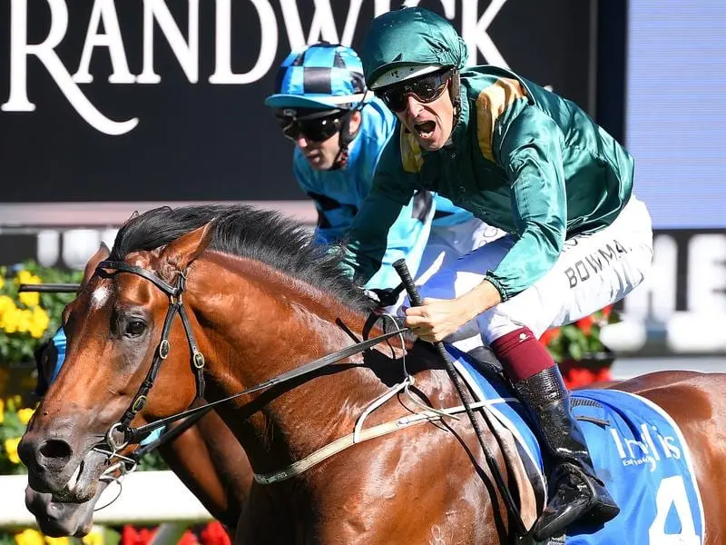 Hugh Bowman reacts as he passes the post riding King's Legacy