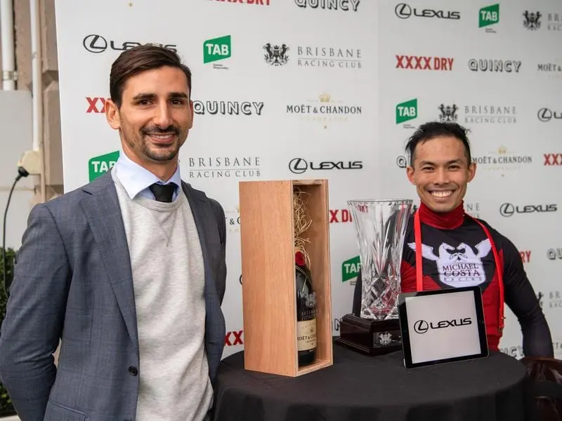 Trainer Michael Costa and jockey Allan Chau after the Gunsynd Classic.