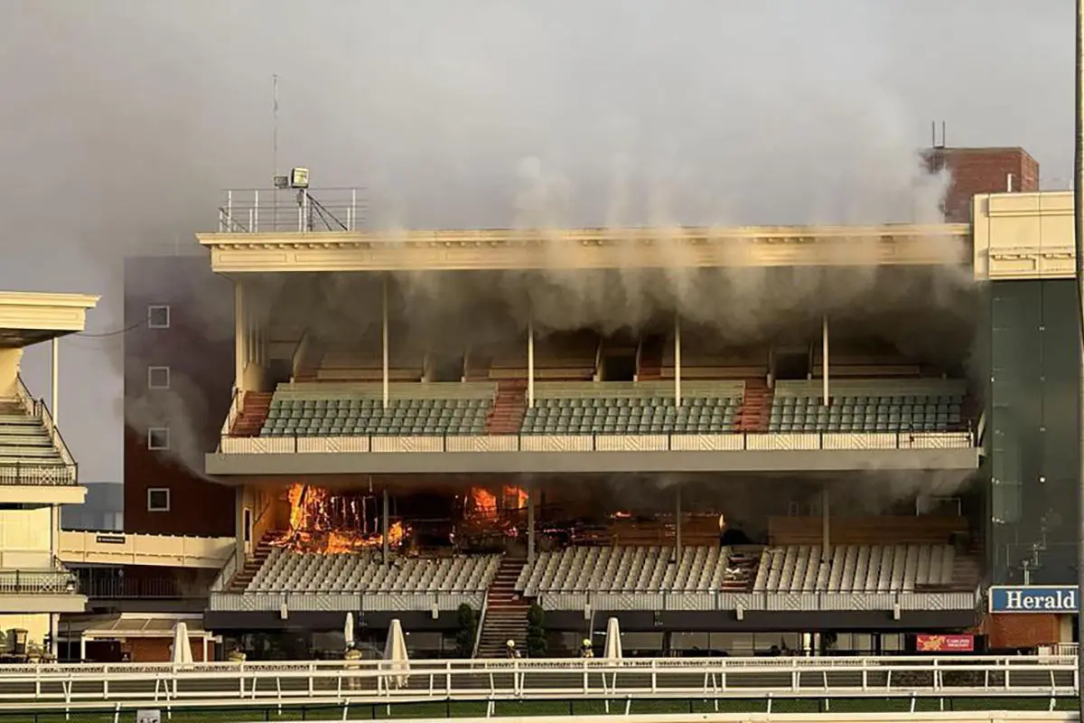 man charged over caulfield fire