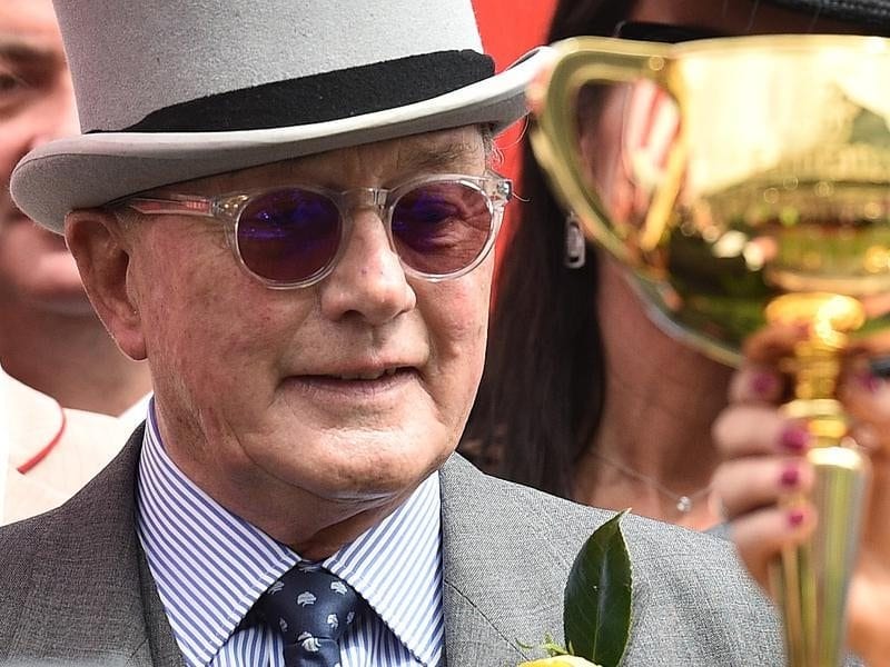 Lloyd Williams is seen alongside the Melbourne Cup