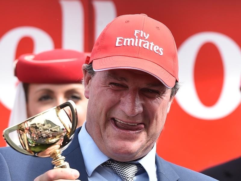 Trainer Darren Weir celebrates winning the 2015 Melbourne Cup.
